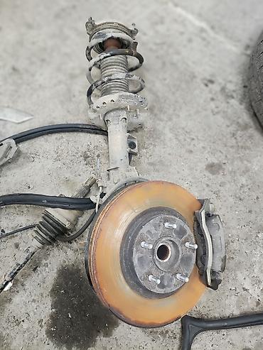 Другие детали ходовой части: Передняя подвеска в сборе для легкового автомобиля. Состав узла: - — 1