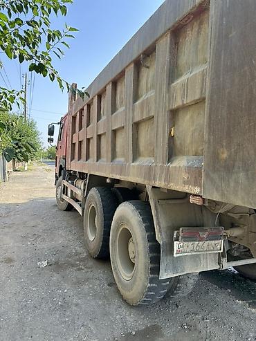 howo shacman: Самосвал HOWO (CNHTC), красный, 6x4 Описание: - Тяжёлый самосвал HOWO — 3