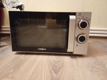 mikrodalqali soba: Mikrodalğalı soba Eurolux, Ayrıca dayanan, Mikrodalğalar ilə, rəng - Gümüşü, İşlənmiş