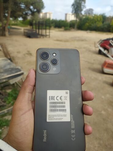 telefonlar qiymeti: Xiaomi Redmi 12, 256 ГБ, цвет - Черный, 
 Отпечаток пальца, Две SIM карты, Face ID