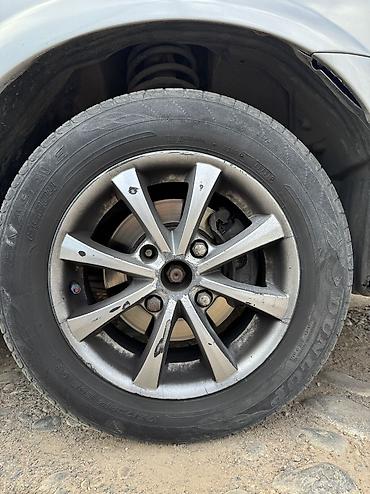 diska 13: Литые диски R14 (кажется 4/100) с шинами Dunlop - Комплект колес на — 4