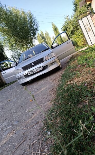 сиденья машины: Mitsubishi Lancer: 2001 г., 1.6 л, Автомат, Бензин