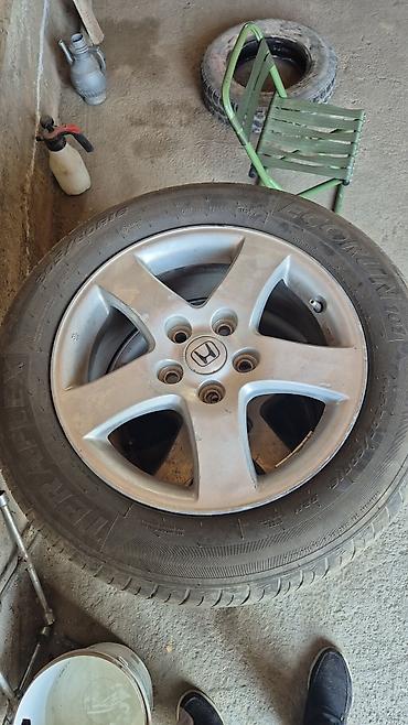 215 65 16 с: Комплект автомобильных колесных дисков с шинами. 1) Колесо Honda: - — 1