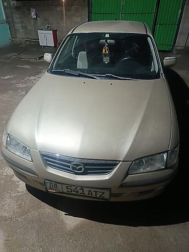 Mazda 626: 2004 г., Седан