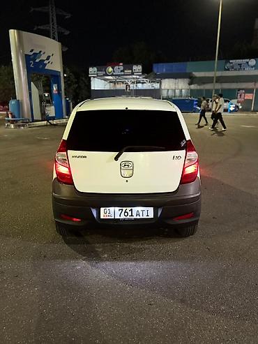 byd e1: Hyundai i10: 2011 г., 1.1 л, Механика, Бензин, Хэтчбэк — 5