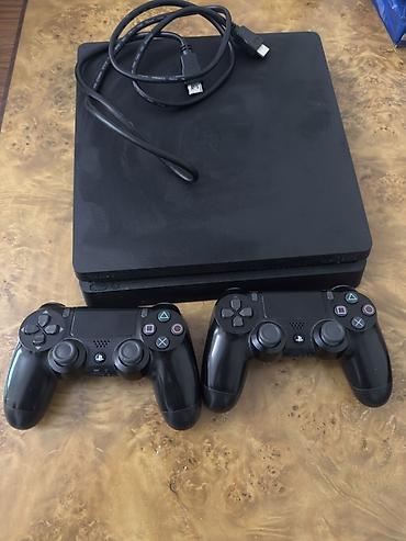 Ps4 slim 1TB ev şəraitində çox az istifadə olunub içərisində 24 ədəd lalafo.az -da Ps4 slim 1TB ev şəraitində çox az istifadə olunub içərisində 24 ədəd