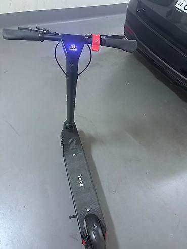 elektrikli scooter toba: Elektrikli skuter – Toba - Rəng: qara, yığcam və minimal dizayn - — 6