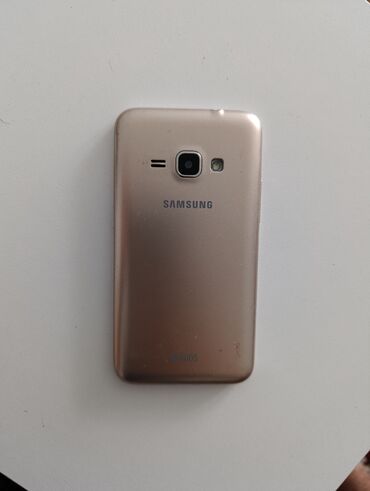 samsung j7 2016 qiymeti: Samsung Galaxy J1 2016, 8 GB, rəng - Qızılı, İki sim kartlı