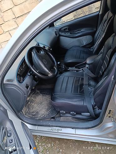 daewoo damas 2002: Daewoo Leganza: 2 l | 2001 il Sedan — 6