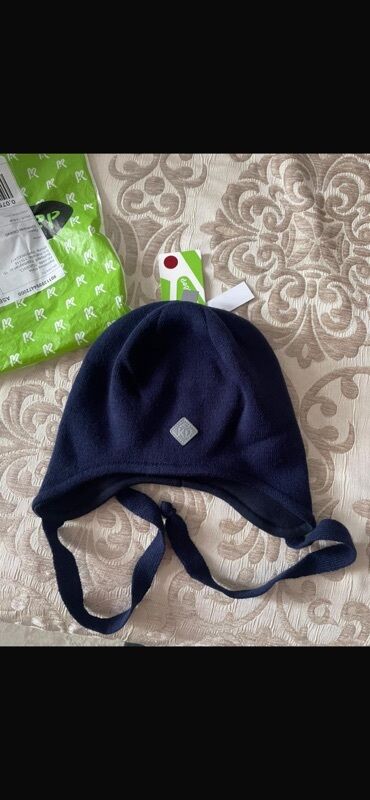 Manejlər: Tezedi‼️Uşaq papağı – tünd göy rəngdə, qulaqlarını örtən model