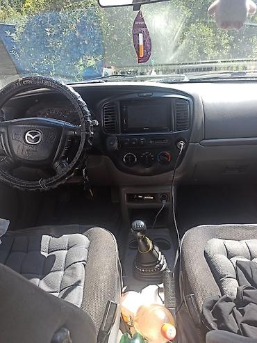 химия на авто: Mazda Tribute: 2001 г., 2 л, Механика, Бензин, Кроссовер — 4