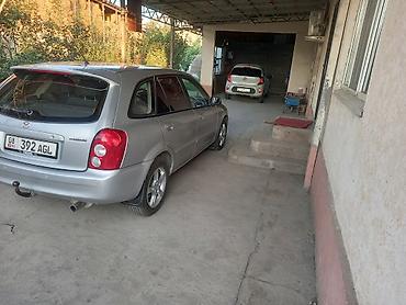 mcv 21: Mazda Familia: 2002 г., 1.6 л, Механика, Бензин, Седан — 2
