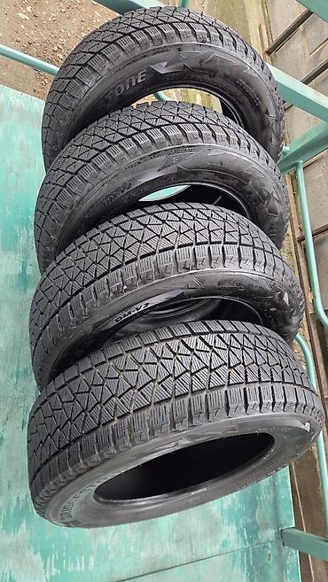 Шины: Зимние шины Bridgestone Blizzak DM-V2, комплект 4 шт. - Размер — 4