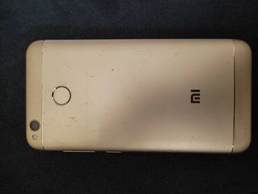 xiaomi redmi 4a gold: Xiaomi Redmi 4X, 32 GB, rəng - Qızılı, 
 Qırıq, Barmaq izi, İki sim kartlı