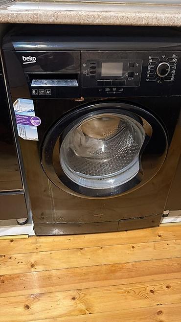 Beko önyükləməli paltaryuyan maşın – qara rəng - Yük tutumu: 8 kq -