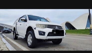 гольф 5: Mitsubishi L200: 2.5 л | 2010 г. 280000 км Пикап
