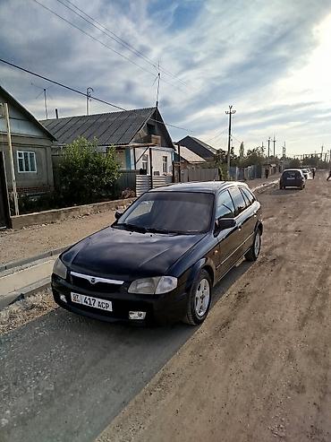 наклейки бмв: Mazda 323: 1999 г., 1.5 л, Механика, Бензин, Универсал — 5