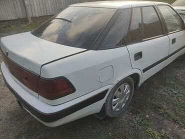 бронирование машина: Daewoo Espero: 1992 г., 1.5 л, Механика, Бензин, Седан