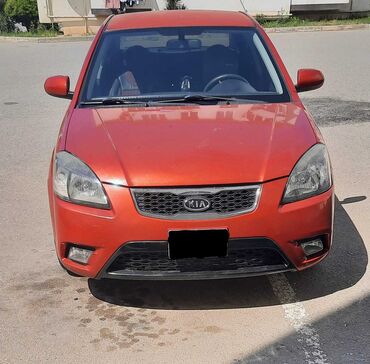 тап аз авто: Kia Rio: 1.4 л | 2010 г. Седан
