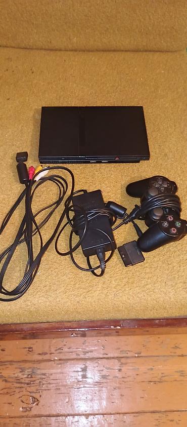 PlayStation 2 Slim (SCPH-77008) oyun konsolu komplekti Komplekt: -