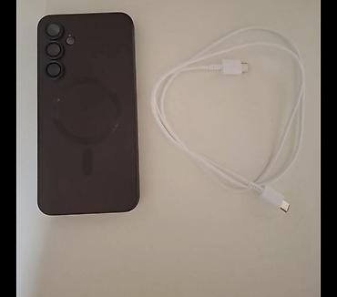 samsung note 20 ultra cena polovan: Smartfon sa USB‑C kablom Opis: - Moderan pametni telefon u tamnoj — 1