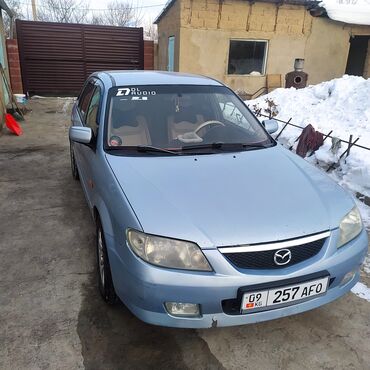 срочно продаю в связи с переездом: Mazda 323: 2002 г., 1.6 л, Механика, Бензин, Вэн/Минивэн