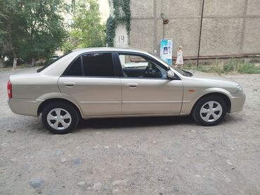 мазда кседос9: Mazda 323: 2002 г., 1.3 л, Механика, Бензин, Седан