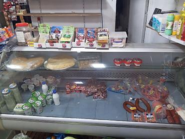 Soyuducu avadanlığı: - Üfüqi ön şüşəli, geniş xidmət bölməsi - Daxili rəflər və məhsul — 2