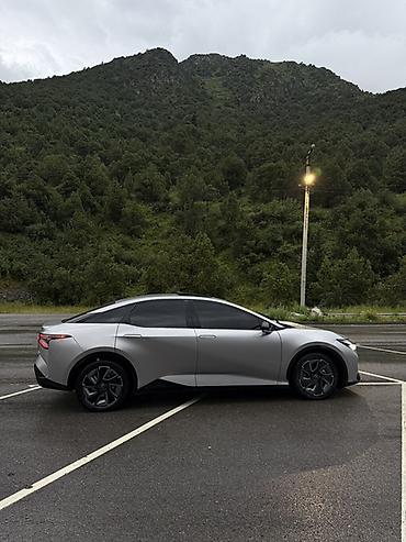 byd e1: Toyota bZ3: 2024 г., Электромобиль, Седан — 2