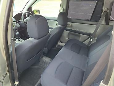 e klass: Mazda Demio: 2003 г., 1.3 л, Автомат, Бензин, Хэтчбэк — 9
