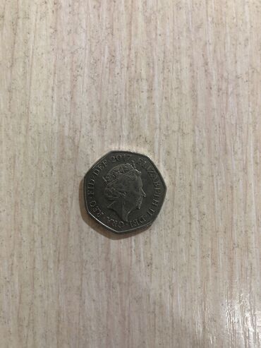 коллекционные монеты бишкек: Великобританский 0,50 $