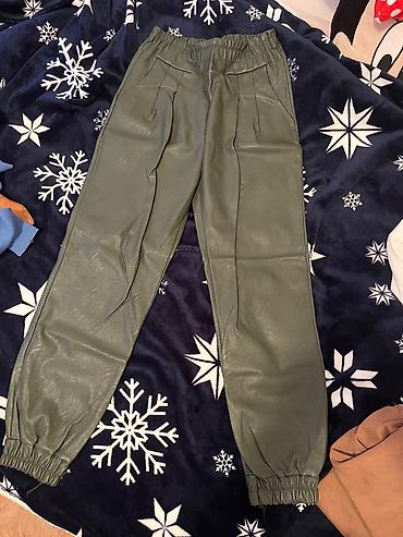 kengurovo blago: Kozne pantalone sve vel akcina 800 djn — 1