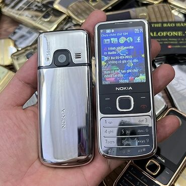 Информатика: Nokia 6700 Slide, 4 ГБ, цвет - Серый, Кнопочный