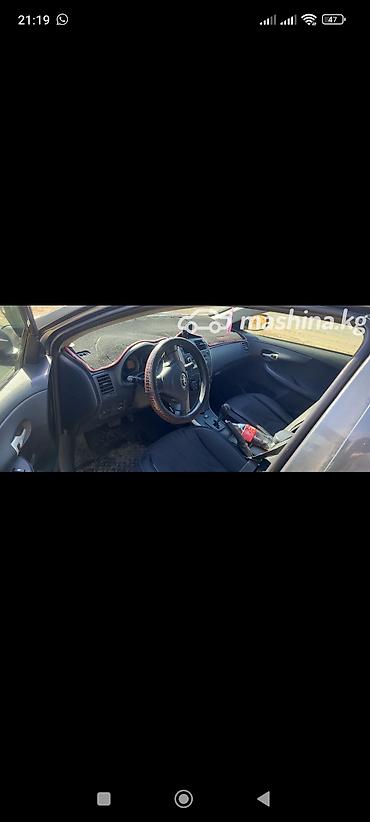 четырка цена: Представляем Toyota Corolla, седан темно-серого цвета. Этот автомобиль — 3