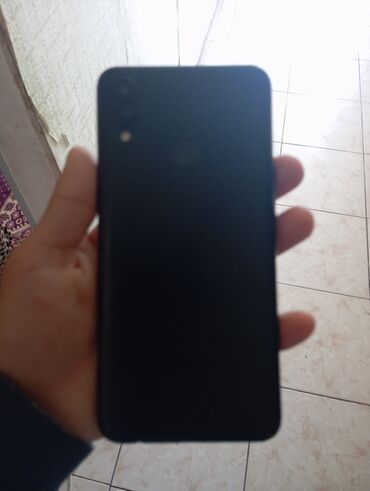 a 40 telefon: Samsung A10s, цвет - Черный, Отпечаток пальца