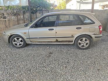 m5 e60 v10: Mazda 323: 2000 г., 1.6 л, Автомат, Бензин, Хэтчбэк — 4