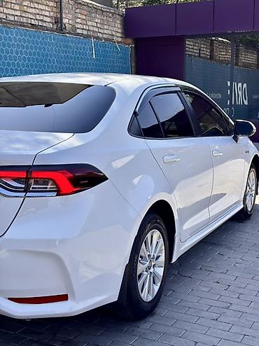 eado ev: Toyota Corolla: 2021 г., 1.8 л, Вариатор, Гибрид, Седан — 5