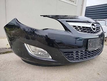 Branici: PREDNJI BRANIK BOJA-CRNA ZA OPEL ASTRA J OD 2009. DO 2015. GOD. | — 2