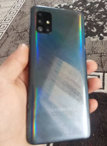 телефон fly fs457 nimbus 15: Samsung Galaxy A51, rəng - Qara, Barmaq izi