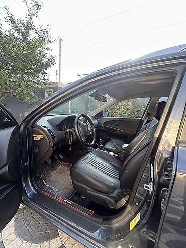 kia optima nece masindi: Kia Cee’d SW (universal), tünd boz rəng. - Gövdə tipi: universal (SW) — 10