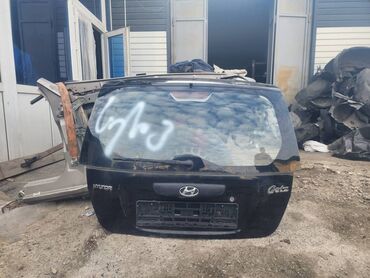 Бамперы: Крышка багажника Hyundai Б/у, цвет - Черный,Оригинал