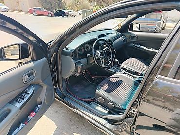 Транспорт: Nissan Sunny: 1.6 л | 2008 г. Седан — 6