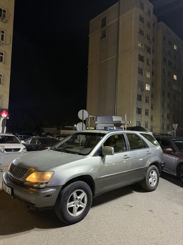 шланг высокого давления гур лексус рх 300: Lexus RX 300 серебристого цвета. Это компактный внедорожник с
