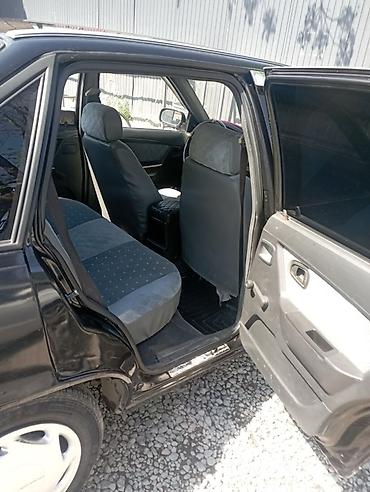 baic eu5: Седан черного цвета с бензиновым двигателем и передним приводом. Кузов — 9