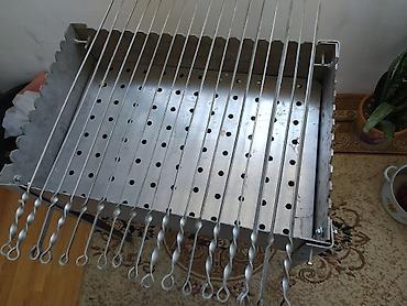 piknik seti: Paslanmayan poladdan sökülüb yığılan manqal və şiş dəsti - Material — 1