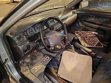 Nissan: Nissan Sunny: 1.4 l | 1999 il Sedan — 6