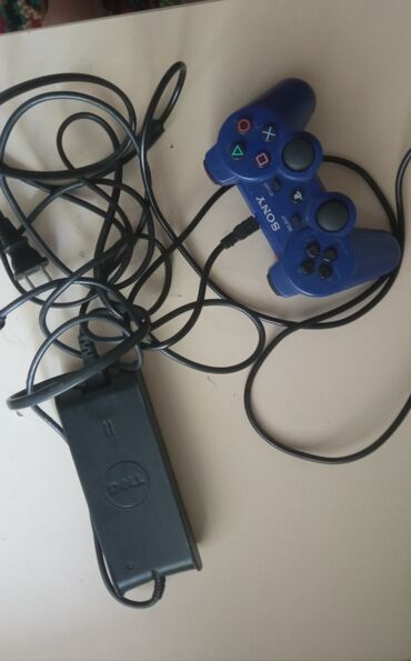 джостик на ps3: Игровой контроллер Sony DualShock в синем цвете, предназначенный для
