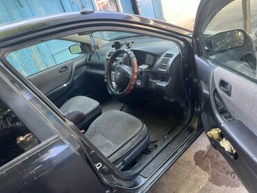 авто из германии в бишкек: Автомобиль Honda Civic с четырьмя дверями, представленный в черном