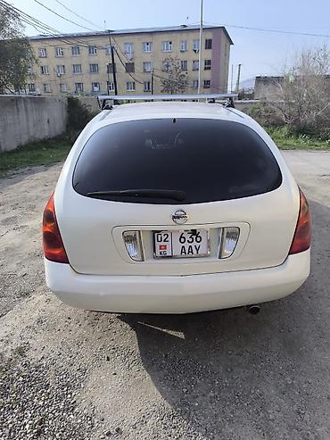 byd q05: Nissan Primera: 2003 г., Универсал — 1