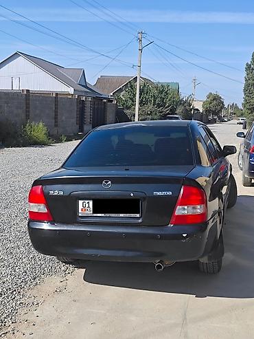 чип панели: Mazda 323: 2002 г., 1.6 л, Автомат, Бензин, Седан — 3